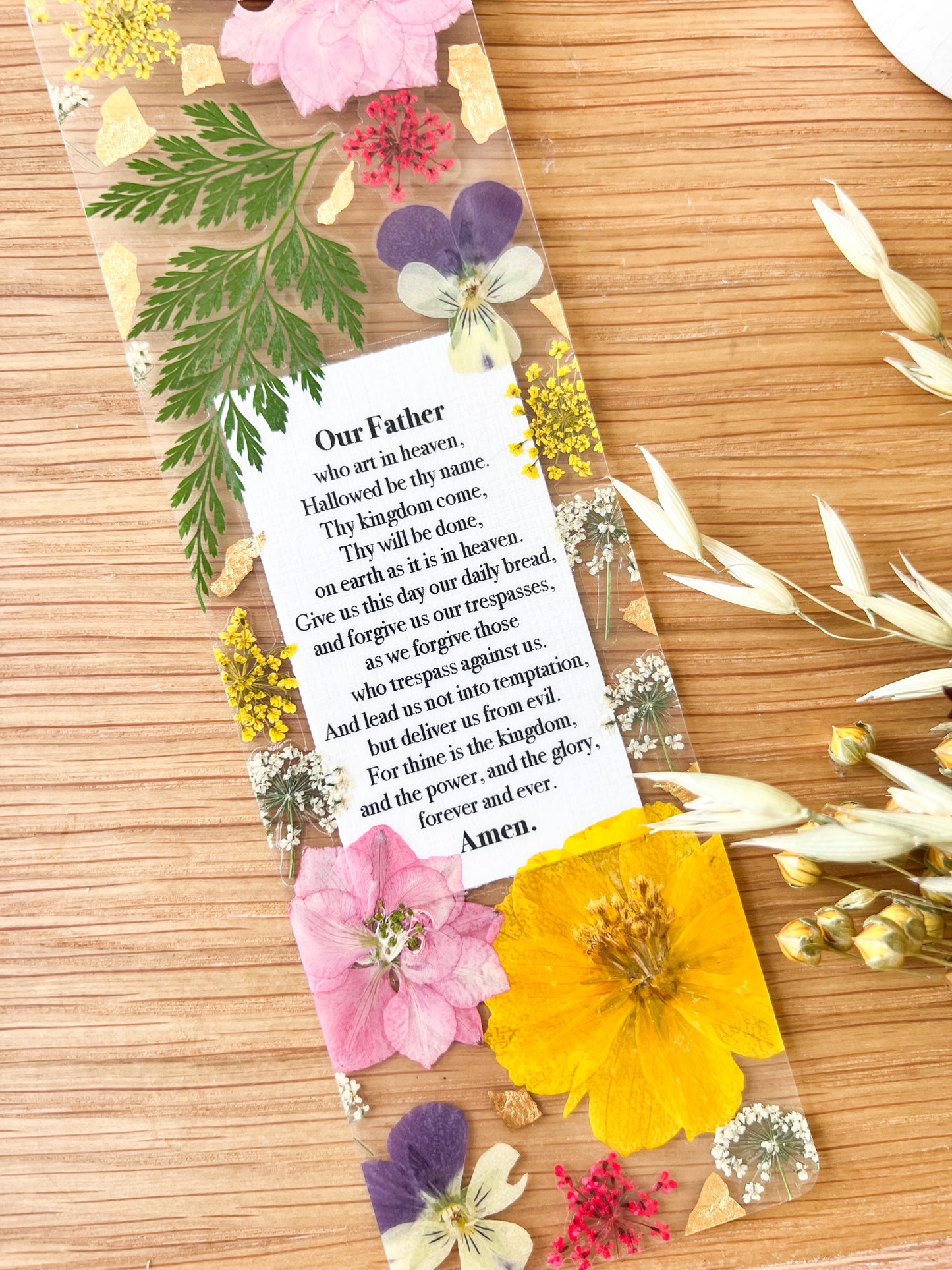 Bookmark includes the following Lord's Prayer : "Our Father who art in heaven, Hallowed be thy name. Thy kingdom come, Thy will be done, on earth as it is in heaven. Give us this day our daily bread, and forgive us our trespasses, as we forgive those who trespass against us. And lead us not into temptation, but deliver us from evil. For thine is the kingdom, and the power, and the glory, forever and ever. Amen."
