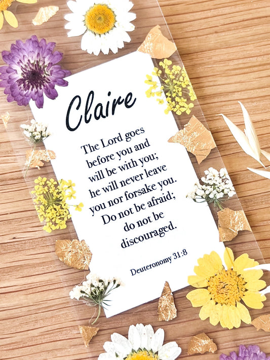  Bookmark includes the following scripture passage : "[custom name] The Lord goes before you and will be with you; he will never leave you nor forsake you. Do not be afraid; do not be discouraged. Deuteronomy 31:8"