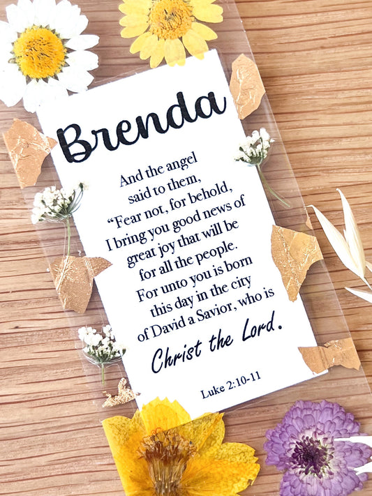  Bookmark includes the following scripture passage : "[custom name] And the angel said to them, “Fear not, for behold, I bring you good news of great joy that will be for all the people. For unto you is born this day in the city of David a Savior, who is Christ the Lord. Luke 2:10-11"