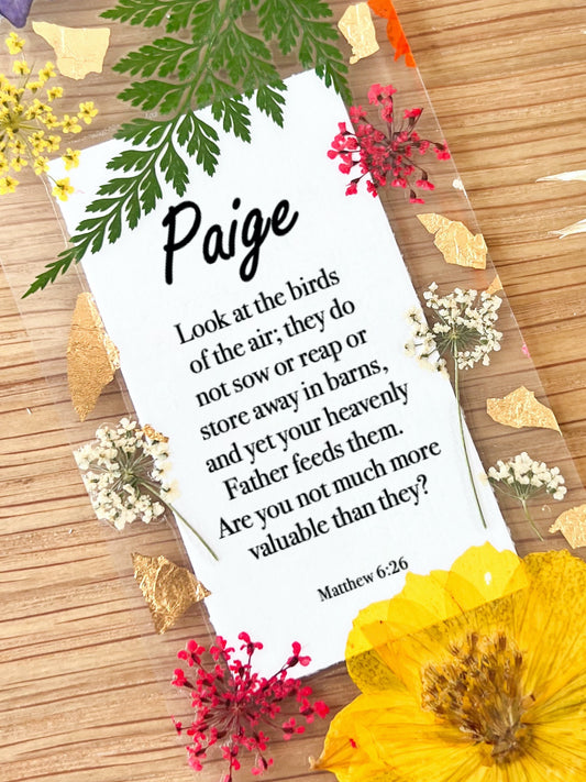 Bookmark includes the following scripture passage : "[custom name] Look at the birds of the air; they do not sow or reap or store away in barns, and yet your heavenly Father feeds them. Are you not much more valuable than they? Matthew 6:26"