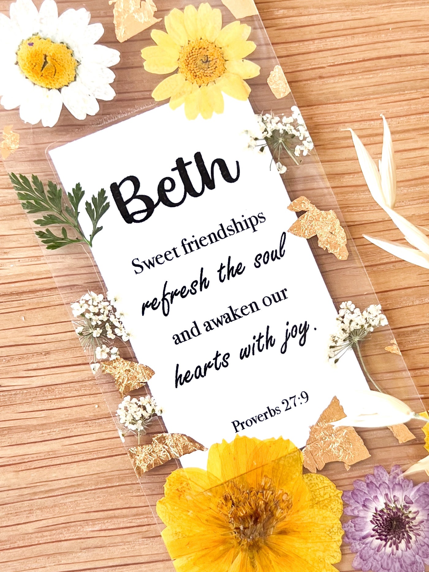  Bookmark includes the following scripture passage : "[custom name] Sweet friendships refresh the soul and awaken our hearts with joy. Proverbs 27:9"