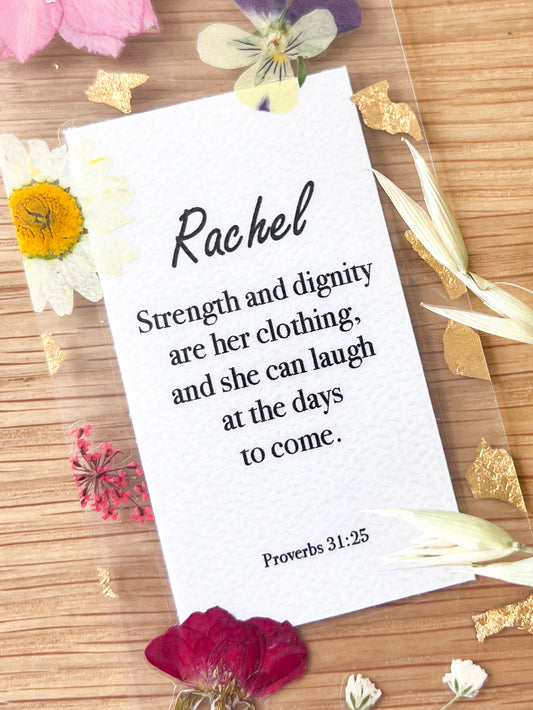  Bookmark includes the following scripture passage : "[custom name] She opens her mouth with wisdom, and the teaching of kindness is on her tongue. Proverbs 31:26