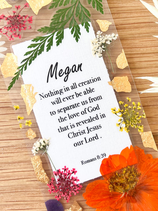 Bookmark includes the following scripture passage : "[custom name] Nothing in all creation will ever be able to separate us from the love of God that is revealed in Christ Jesus our Lord . Romans 8:39