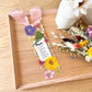Bookmark includes the following message: Mom Noun:[custom name] Definition: 1. Loving mother; 2. Beautiful and kind; 3. Gracious and encouraging; 4. Accepts me for who I am; 5. Everything that is lovely, sweet and amazing in this world.