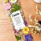 Bookmark includes the following quote by Alfred Tennyson: "If I had a flower for every time I thought of you. I could walk through my garden forever."
