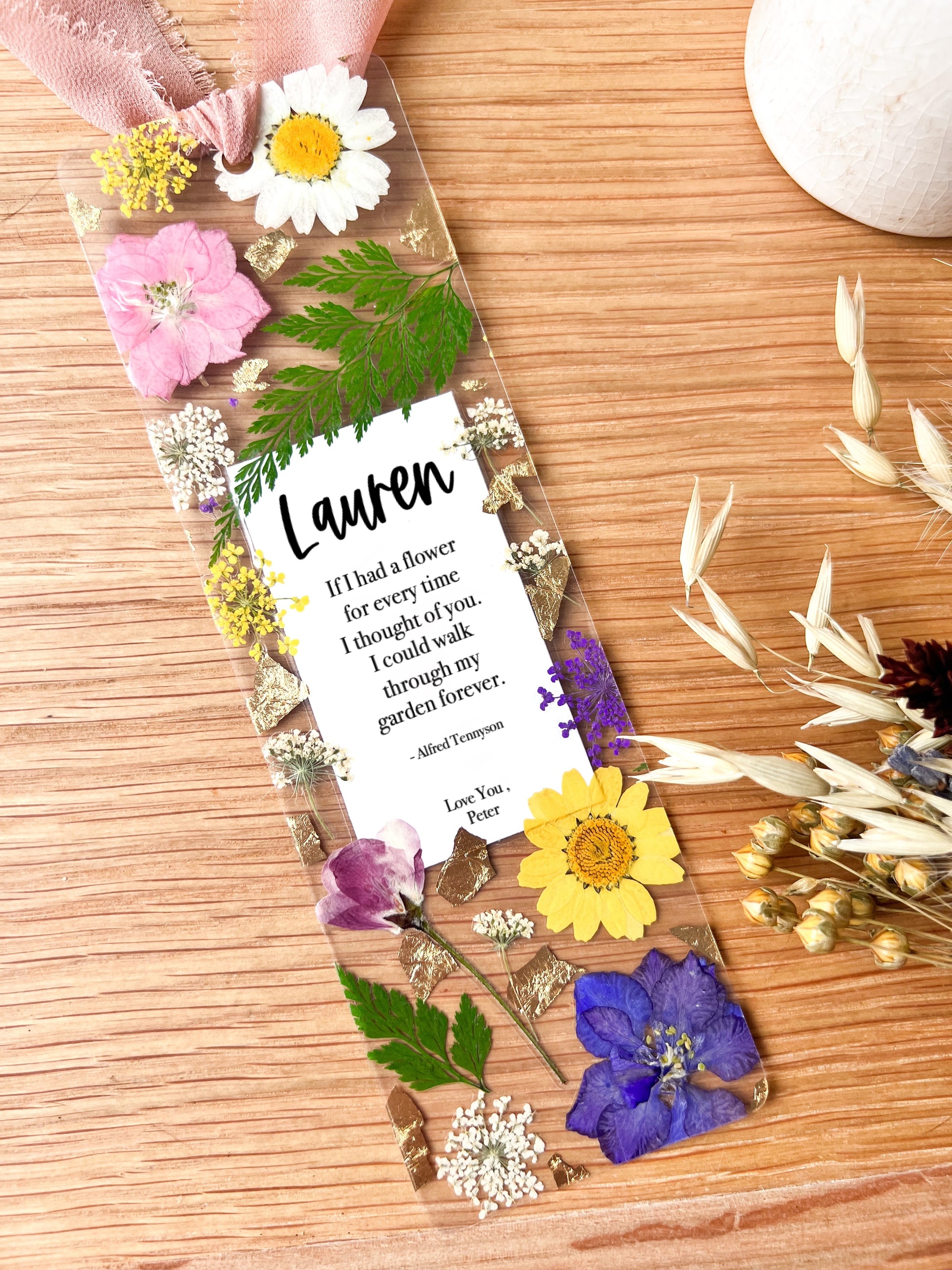 Bookmark includes the following quote by Alfred Tennyson: "If I had a flower for every time I thought of you. I could walk through my garden forever."