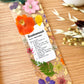Bookmark includes the following quote : Bridesmaid [custom name] Definition: 1. A best friend or sister; 2. Knows me well and accepts me for who I am; 3. A good listener & confidant; 4. Stands by the bride during the wedding ceremony; 5. Hopefully you!