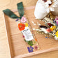Bookmark includes the following quote : Bridesmaid [custom name] Definition: 1. A best friend or sister; 2. Knows me well and accepts me for who I am; 3. A good listener & confidant; 4. Stands by the bride during the wedding ceremony; 5. Hopefully you!