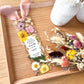 Bookmark includes the following romantic quote by Emily Brontë (Wuthering Heights): "He's more myself than I am. Whatever our souls are made of, his and mine are the same. [custom names][custom dates]"