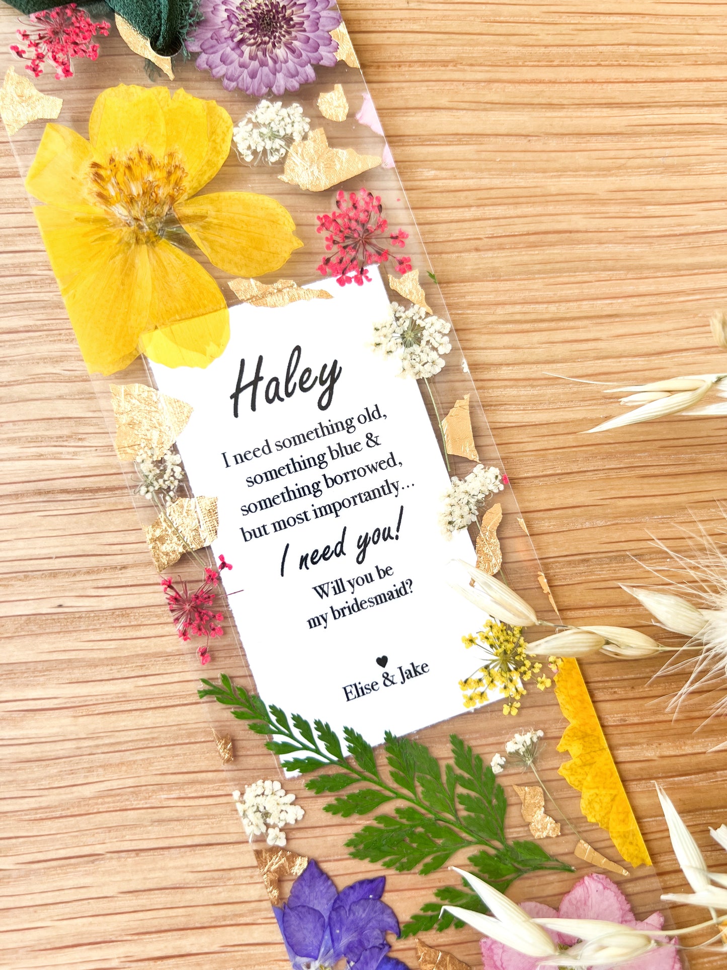  Bookmark includes the following quote : "[custom name] I need something old, something blue & something borrowed... but most importantly.. I need you! Will you be my bridesmaid? [custom names]"